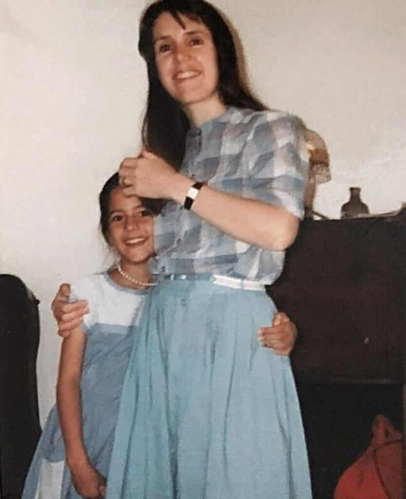 A childhood photo of Katrina with her mother